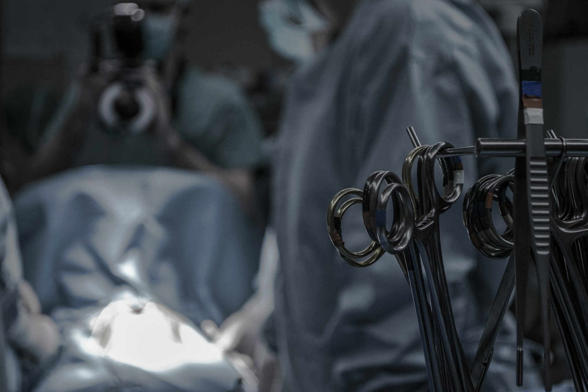 surgical scissors near doctors in operating room